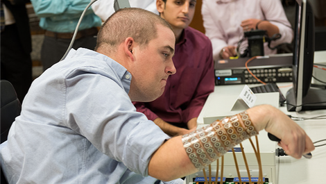Burkhart testing the device. Image: Ohio State University/ Batelle
